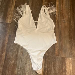 Cute bodysuit never worn, tags removed